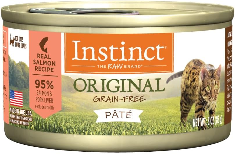 'Instinct Original wet cat food cans displayed on a kitchen counter'